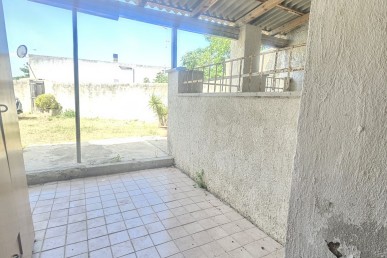 Bilocale  con terreno