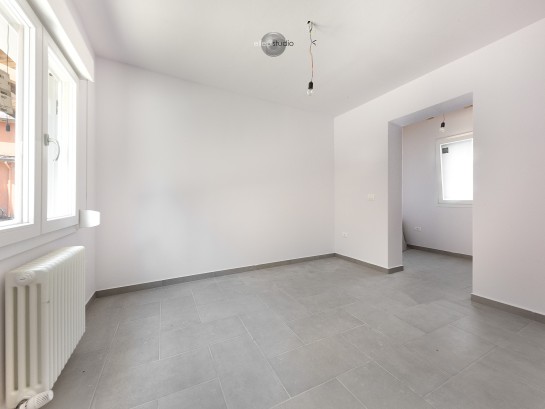 Porzione di casa con giardino