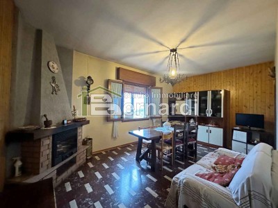 Appartamento con giardino e ga...